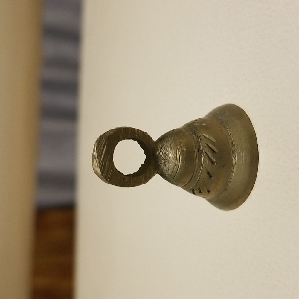 Tiny brass bell